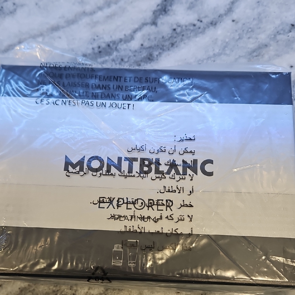 Montblanc Explorer Packaging in Black and Gray colonge set .